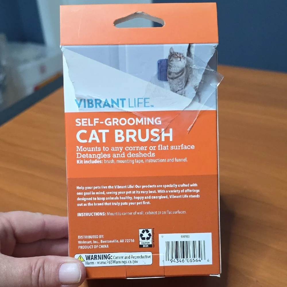 Vibrant Self-Grooming Cat Brush in Purple